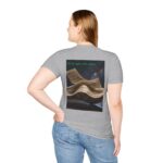 Woman wearing sport grey Whale Breach Unisex T-Shirt while standing– back view