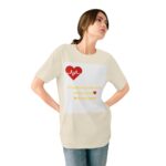 Woman wearing natural Heartbeat & Sunset Silhouette T-shirt while standing – front view
